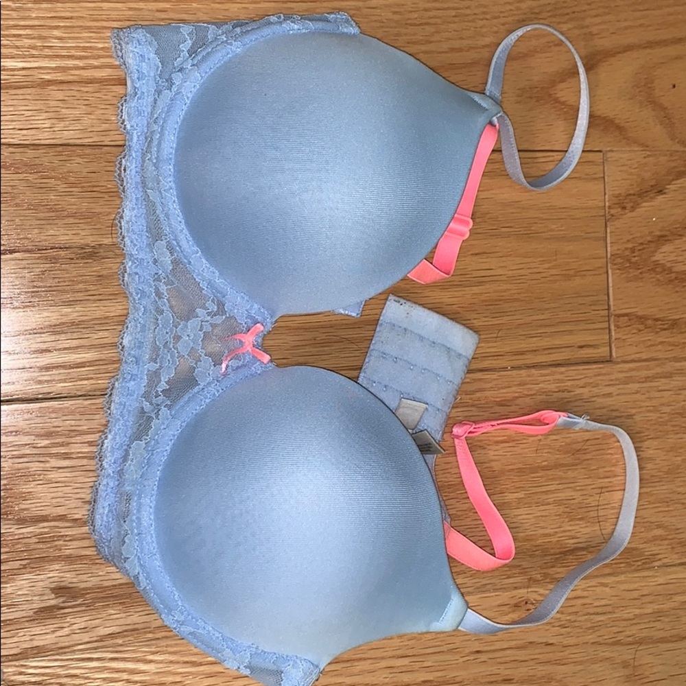 Adorable light blue bra with bright pink accents!
